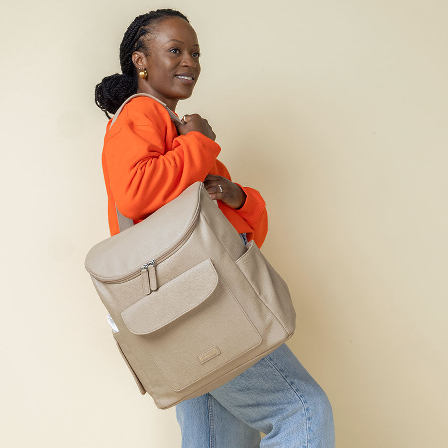 Lennox Convertible Baby Backpack Oat | Changing Bags | Babymel